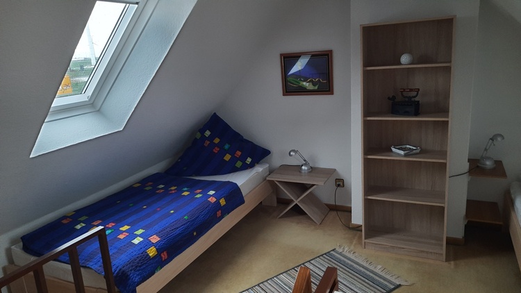 Schlafzimmer mit 2 Einzelbetten Dachstudio