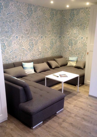 Wohnzimmer mit Schlafsofa