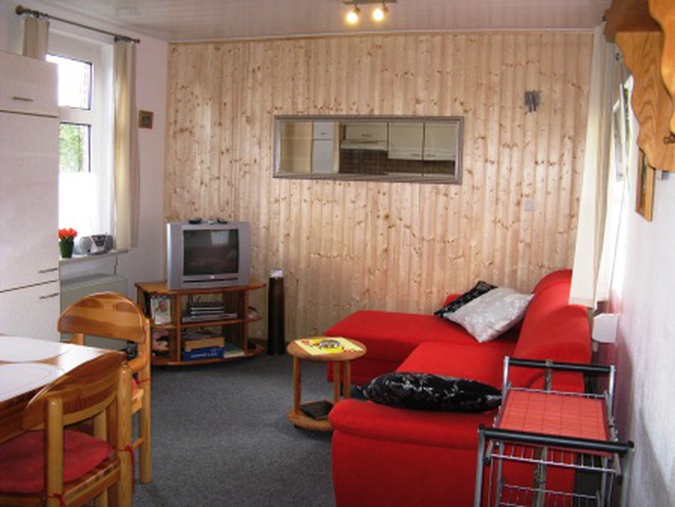 Wohnzimmer mit Küche