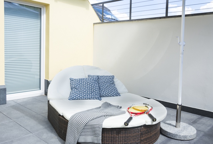 Terasse mit Lounge-Möbeln