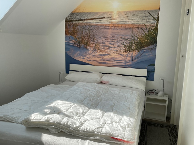Schlafzimmer mit Doppelbett